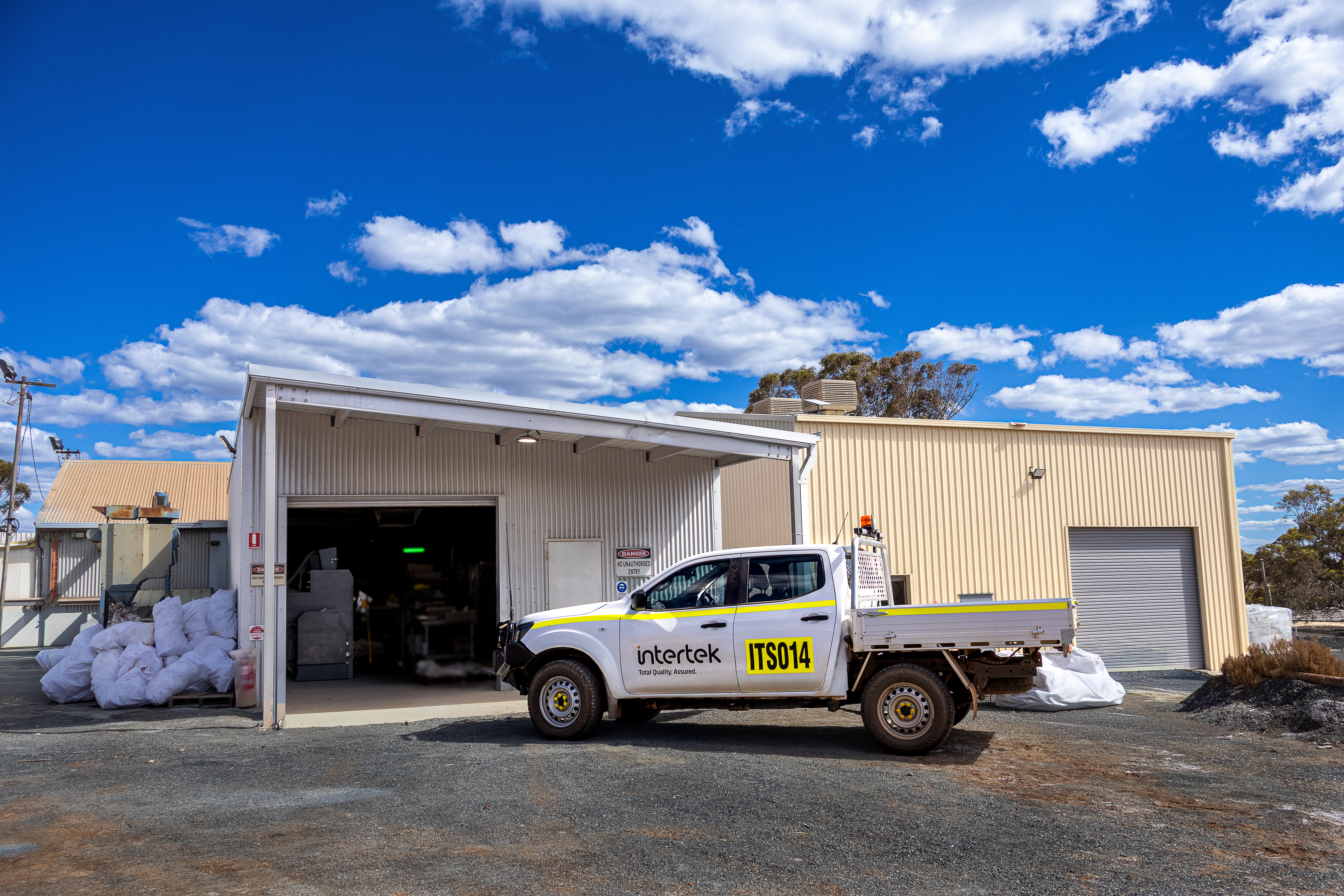 Intertek Vehicle parked outside minesite laboratory in Norseman