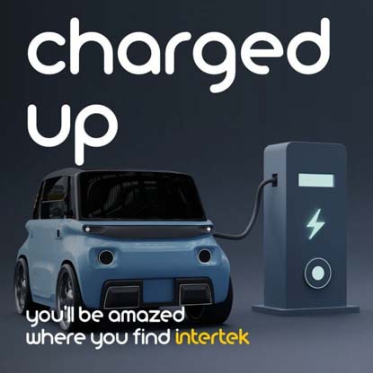 A compact electrical vehicle at a charging station